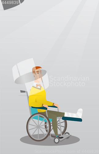 Image of Man with broken leg sitting in a wheelchair.