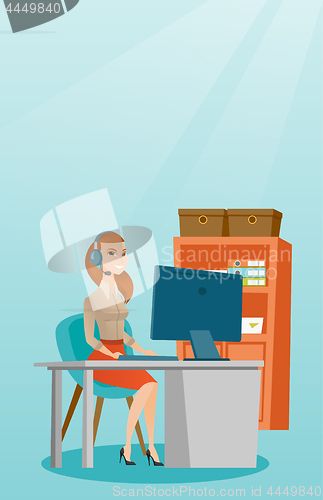 Image of Business woman with headset working at office.