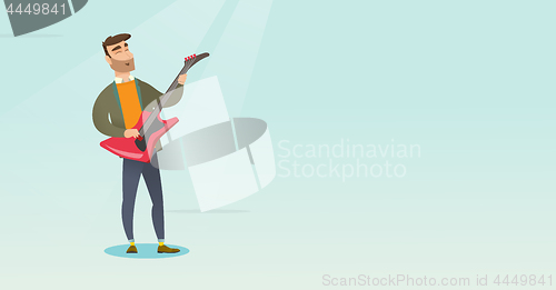 Image of Man playing the electric guitar.