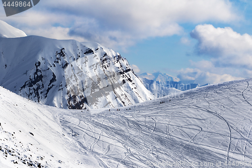 Image of Snow off piste slope for freeriding with traces from skis, snowb