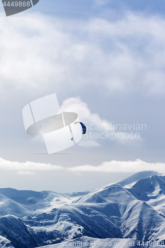 Image of Sky gliding in winter snow mountains