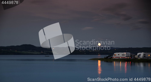 Image of Moonrise over norvegian camping