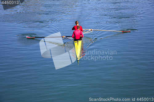 Image of Two scull rowing competitor, rowing race two rower