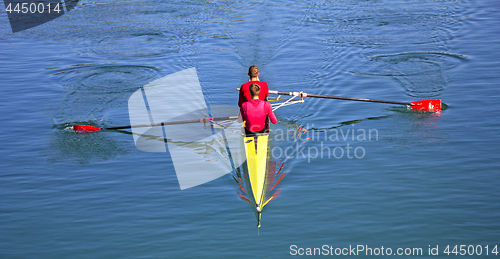 Image of Two scull rowing competitor, rowing race two rower