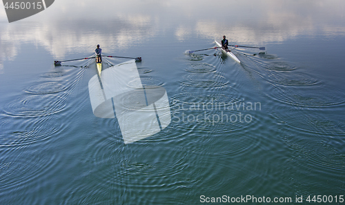 Image of Two scull rowing competitor, rowing race two rower