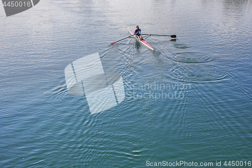 Image of Single scull rowing competitor, rowing race one rower