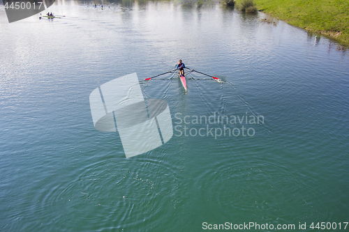 Image of Single scull rowing competitor, rowing race one rower