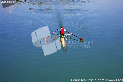 Image of Single scull rowing competitor, rowing race one rower