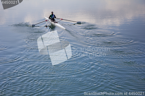 Image of Single scull rowing competitor, rowing race one rower