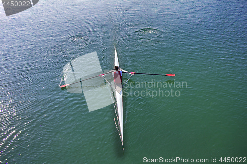 Image of Single scull rowing competitor, rowing race one rower