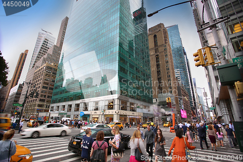 Image of New York, USA – August 20, 2018: Busy sidewalk at the intersec