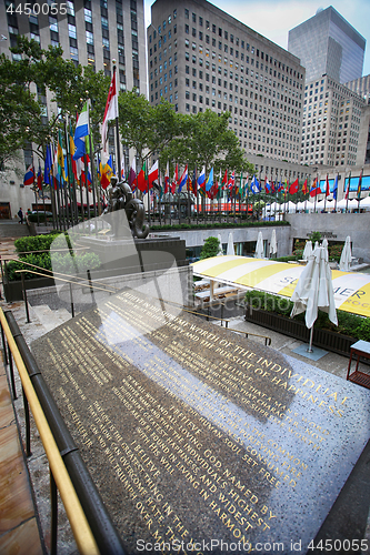 Image of New York, USA – August 23, 2018: Rockefeller Center, flagpoles