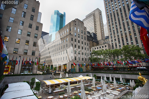 Image of New York, USA – August 23, 2018: Rockefeller Center, flagpoles