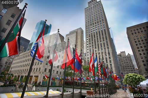 Image of New York, USA – August 23, 2018: Rockefeller Center, flagpoles
