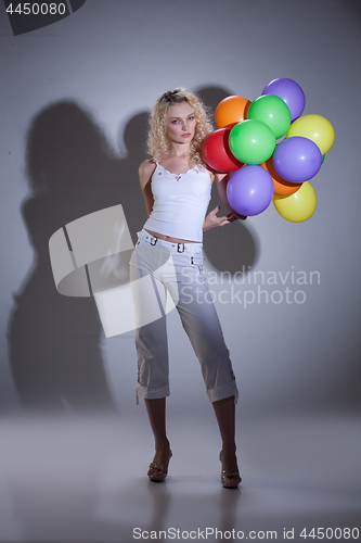 Image of Young Woman With Balloons