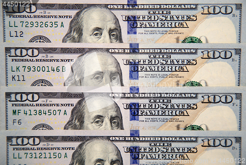 Image of Close up of new hundred dollar bill with portrait of Franklin