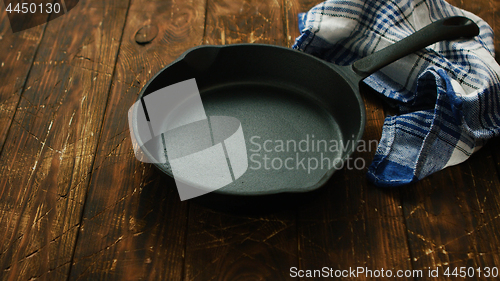 Image of Cast iron pan on table