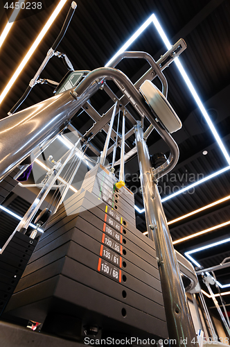 Image of Gym interior with multistation machine