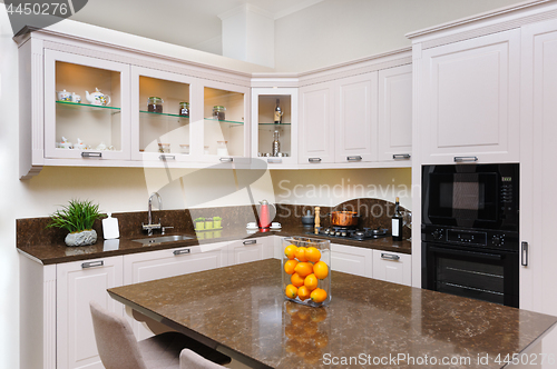 Image of Luxury modern beige kitchen interior