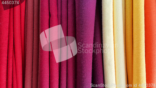 Image of Bright multicolored background of fabrics