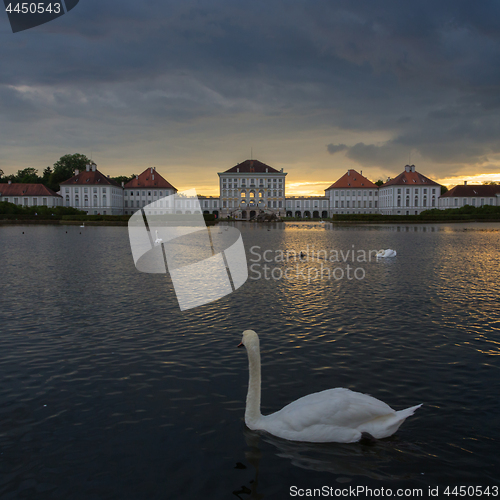 Image of Dramatic scenery of post storm sunset of Nymphenburg palace in Munich Germany.