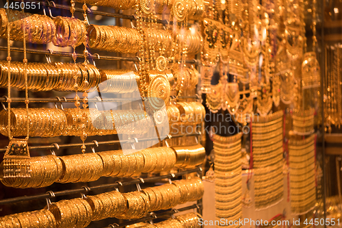 Image of gold jewelry in the shop window