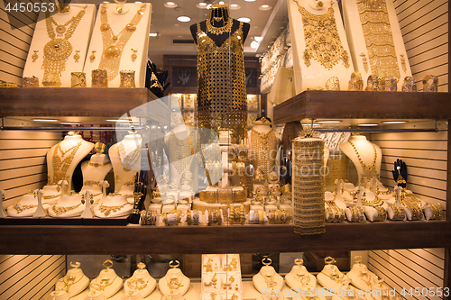 Image of gold jewelry in the shop window