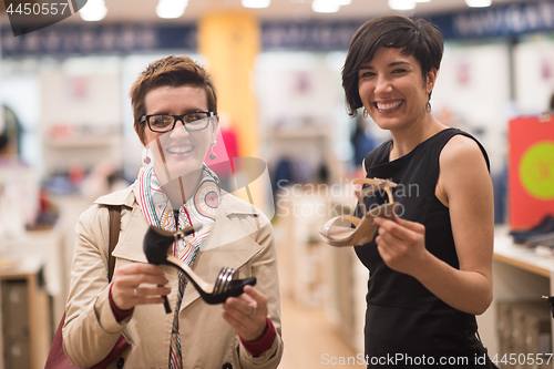 Image of best friend shopping in big mall