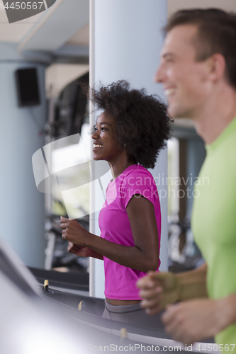 Image of people exercisinng a cardio on treadmill