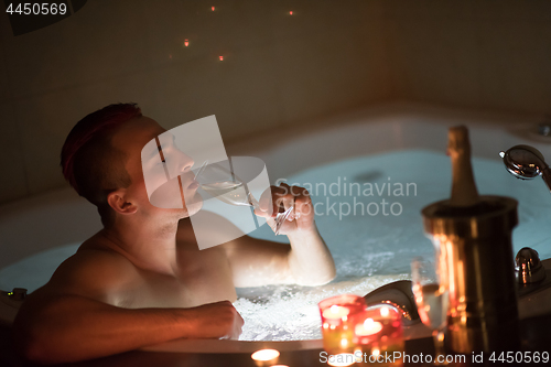 Image of man relaxing in the jacuzzi