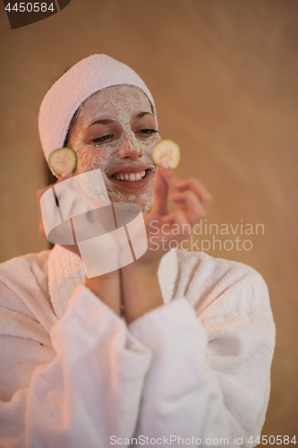 Image of Spa Woman applying Facial Mask