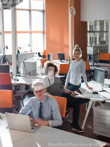 Image of businessman working using a laptop in startup office