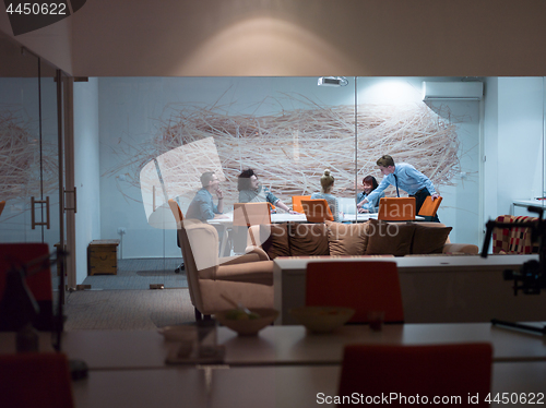 Image of Business Team At A Meeting at modern office building