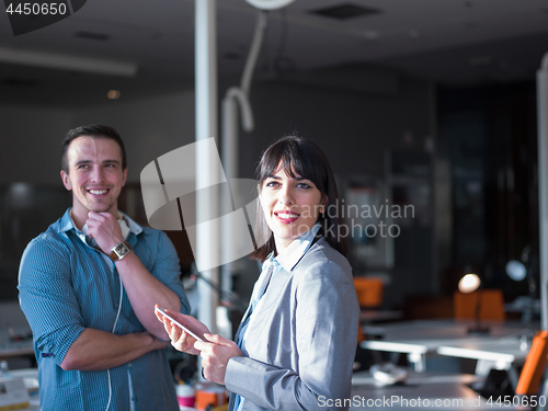 Image of Business People Working With Tablet in office