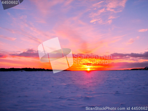 Image of Winter sunset over frozen Baltic Sea in Finland