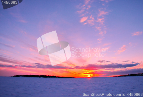 Image of Winter sunset over frozen Baltic Sea in Finland