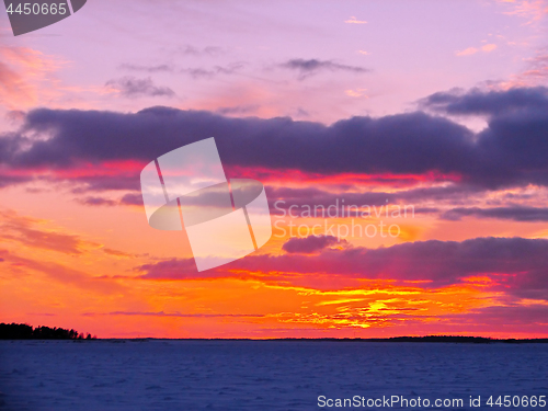 Image of Winter sunset over frozen Baltic Sea in Finland