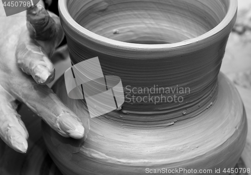 Image of Process of making crockery on a potter\'s wheel