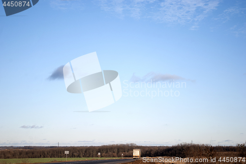 Image of road and passing truck