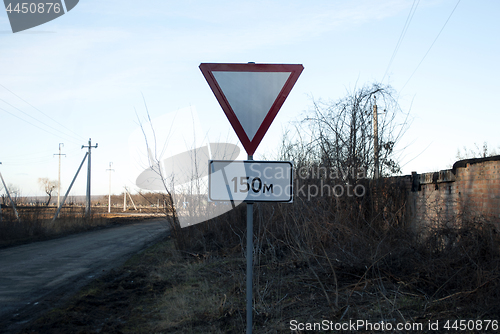 Image of road sign giving way