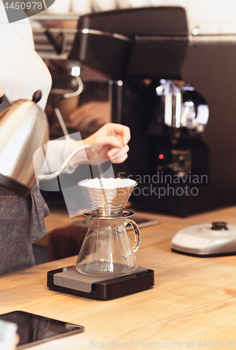 Image of Barista, cafe, making coffee, preparation and service concept