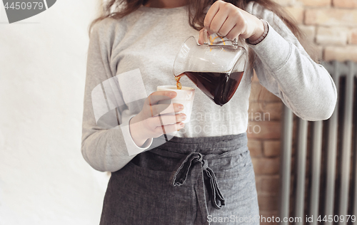 Image of Barista, cafe, making coffee, preparation and service concept