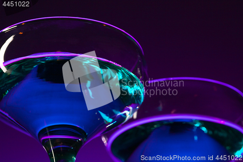 Image of Two wine glasses standing on the table at studio