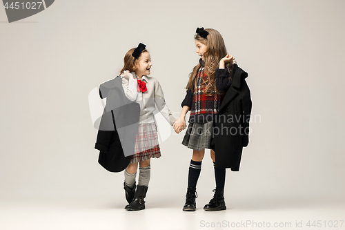 Image of The fashion portrait of young beautiful teen girls at studio