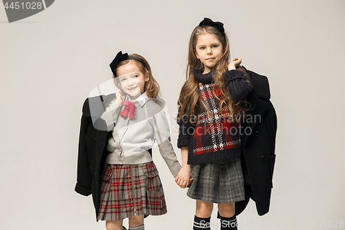 Image of The fashion portrait of young beautiful teen girls at studio