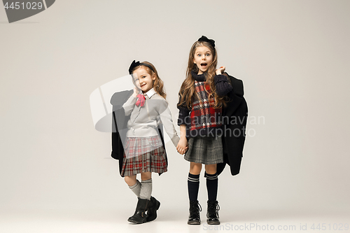 Image of The fashion portrait of young beautiful teen girls at studio