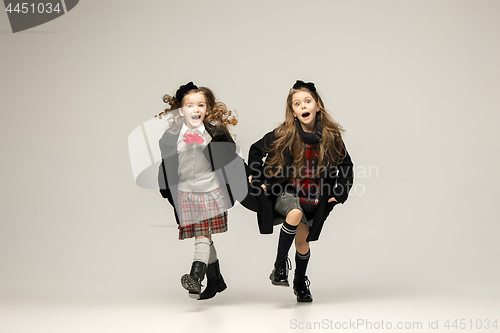 Image of The fashion portrait of young beautiful teen girls at studio