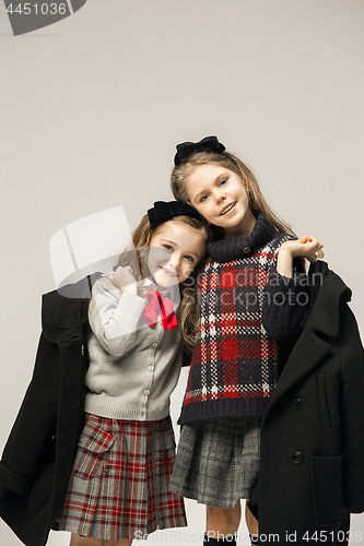 Image of The fashion portrait of young beautiful teen girls at studio