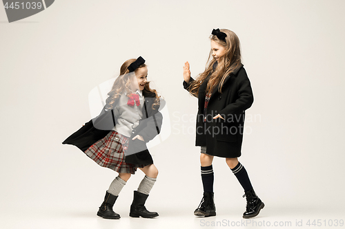 Image of The fashion portrait of young beautiful teen girls at studio