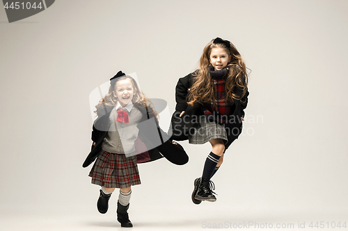 Image of The fashion portrait of young beautiful teen girls at studio